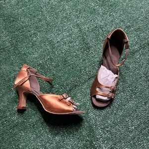 Brown satin heels with rhinestone details